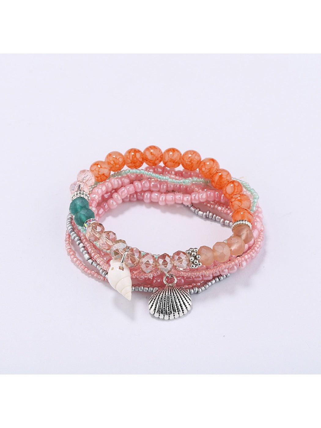 Lovra delicate beaded bracelet held in hand showing clasp and beads