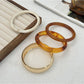 Close-up of Lovra ombre bangle bracelet highlighting smooth color transition