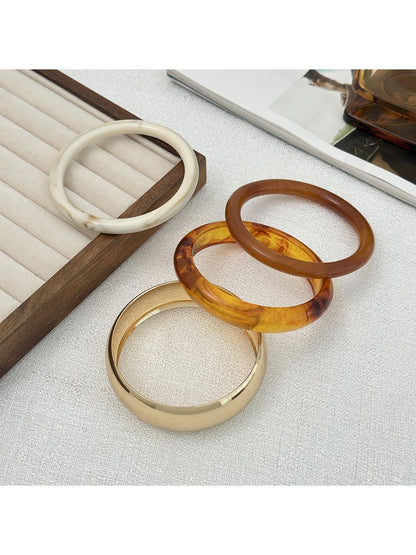 Close-up of Lovra ombre bangle bracelet highlighting smooth color transition