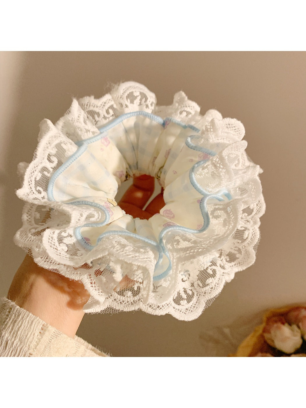 Side view of Gifty printed scrunchie showing gathered fabric texture and pattern