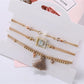Lovra bracelet with tassel pendant and small beads arranged in a circle