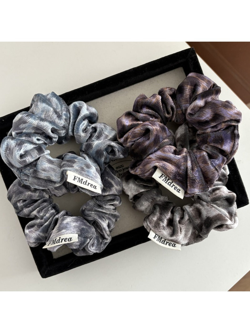 Gifty Dreamy Silky Retro Scrunchie displayed on a white background showing smooth texture
