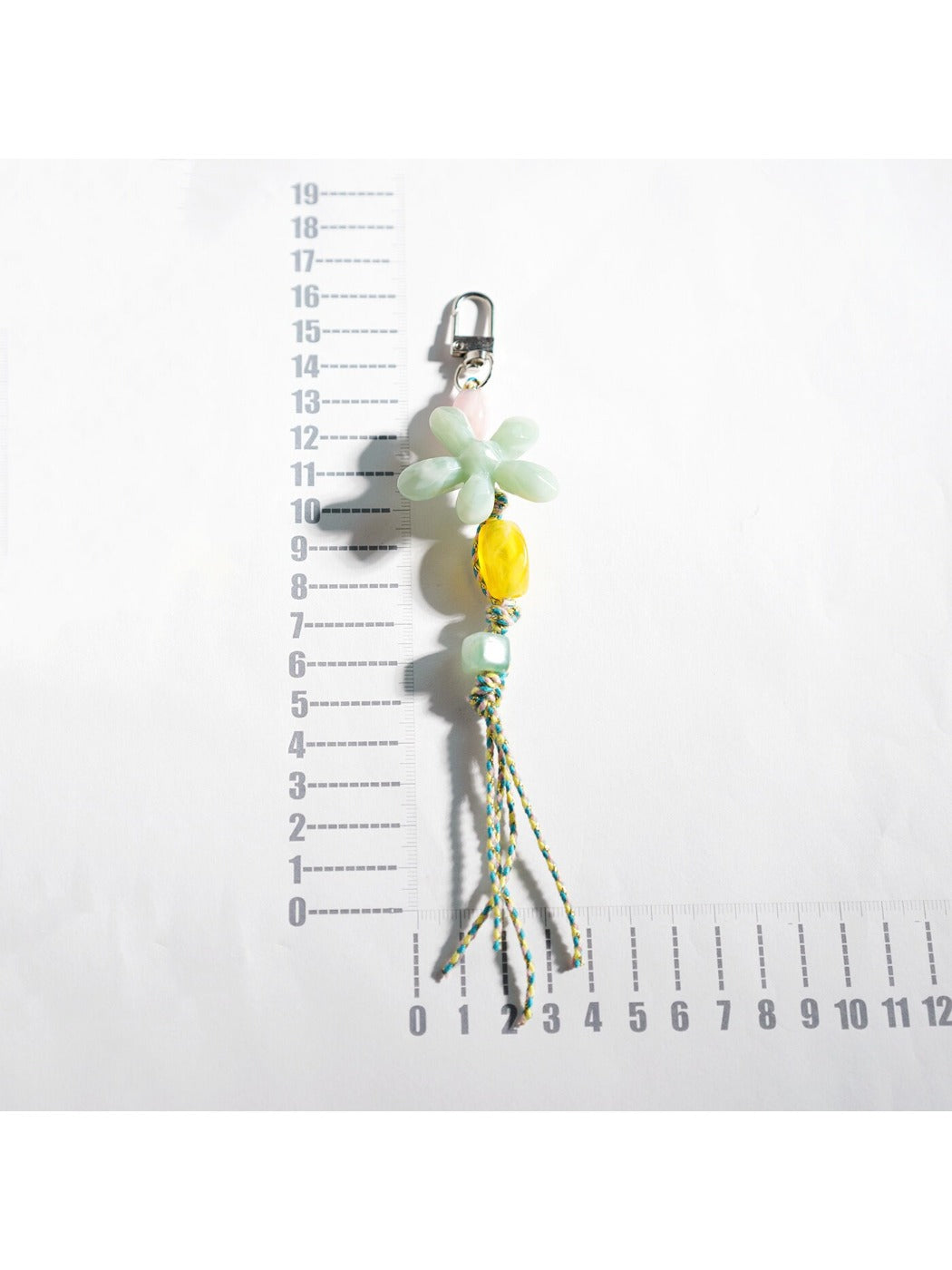 Top view of Keypus acrylic beaded flower keychain showing detailed beadwork