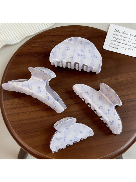 Beau blue floral print hair claw clip on white background showing front view