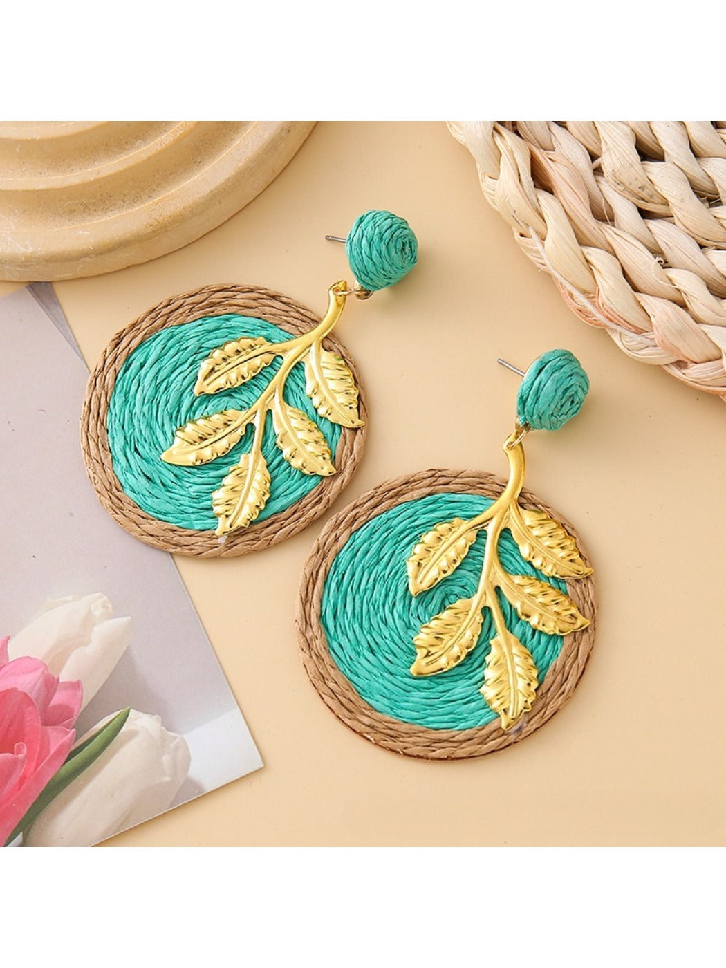 Earedge round leaf pendant earrings photographed with natural lighting