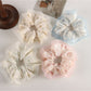 Gifty Sweet Graceful Floral Scrunchie displayed on a white background showing fabric texture