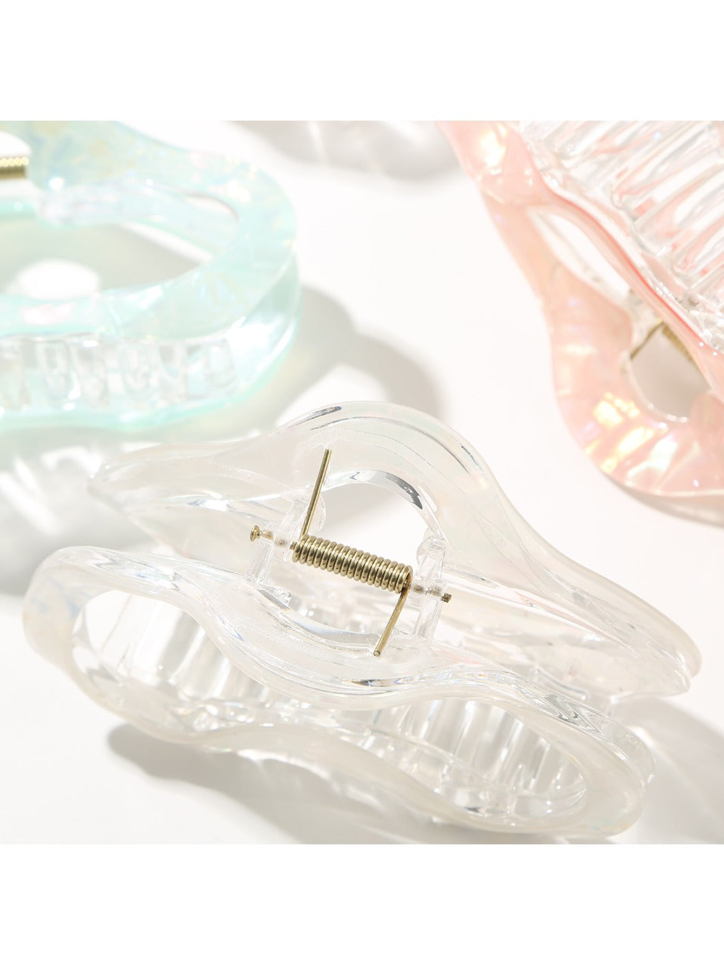 Beau Pretty Cloud Shaped Hair Clip held in hand to show size and scale