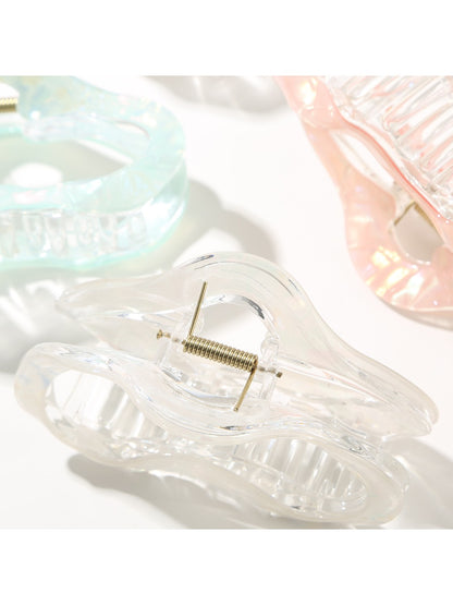 Beau Pretty Cloud Shaped Hair Clip held in hand to show size and scale