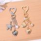 Starfish shaped heart keychain in rose gold metal with engraved details