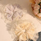 Gifty Ditsy Floral Lace Trim Scrunchie displayed on a white background showing lace trim detail