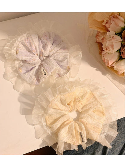 Gifty Ditsy Floral Lace Trim Scrunchie displayed on a white background showing lace trim detail