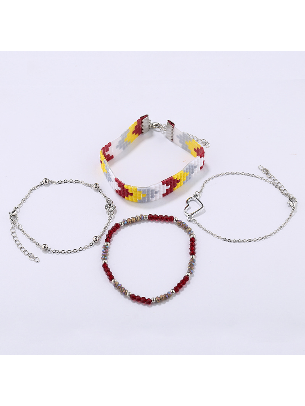 Set of Lovra boho stackable beaded bracelets displayed on a white surface