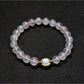 Lovra pastel beaded bracelet on a wooden surface, showcasing bead colors and smooth finish
