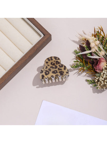 Beau leopard print hair clip displayed alongside matching accessories