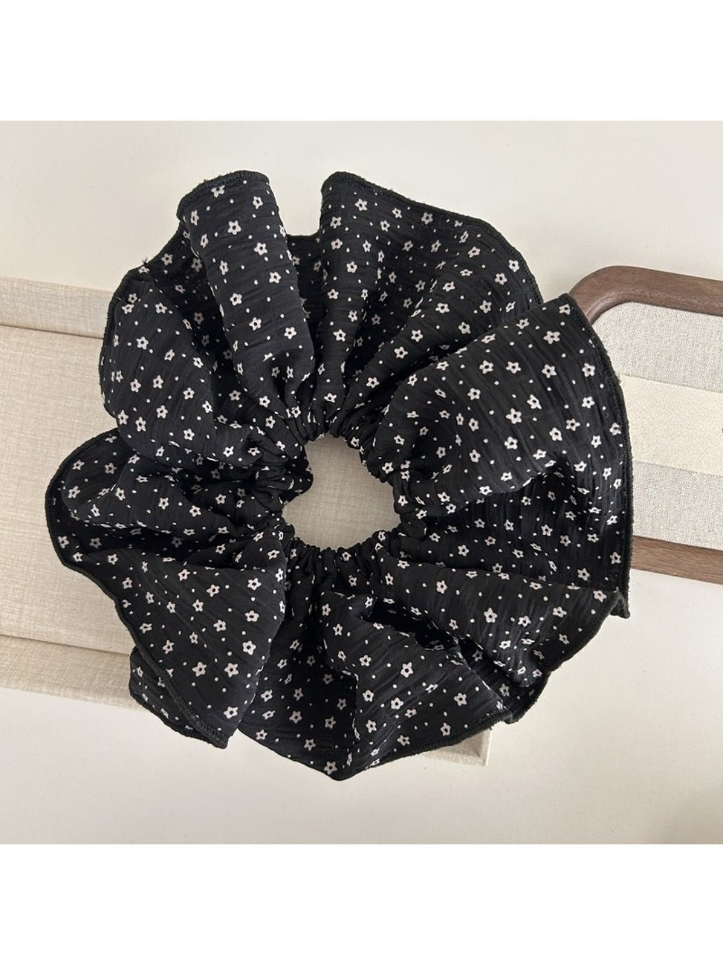 Gifty large scrunchie displayed on a white background showing fabric texture
