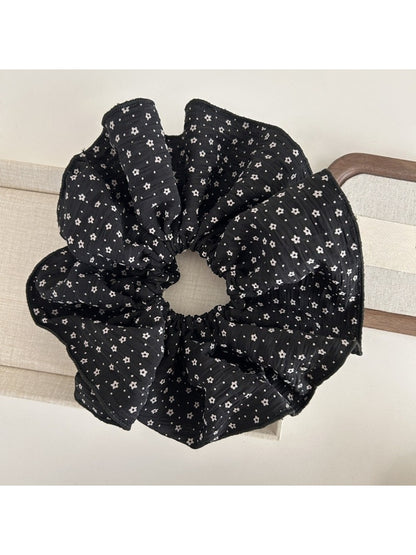 Gifty large scrunchie displayed on a white background showing fabric texture