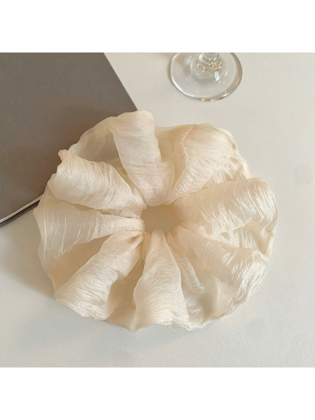 Scrunchie styled on a wrist as a simple, elegant accessory