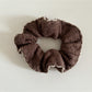 Gifty scrunchie laid flat to display full fabric design and elastic band
