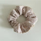Gifty scrunchie worn in hair, showcasing its trendy and pretty look