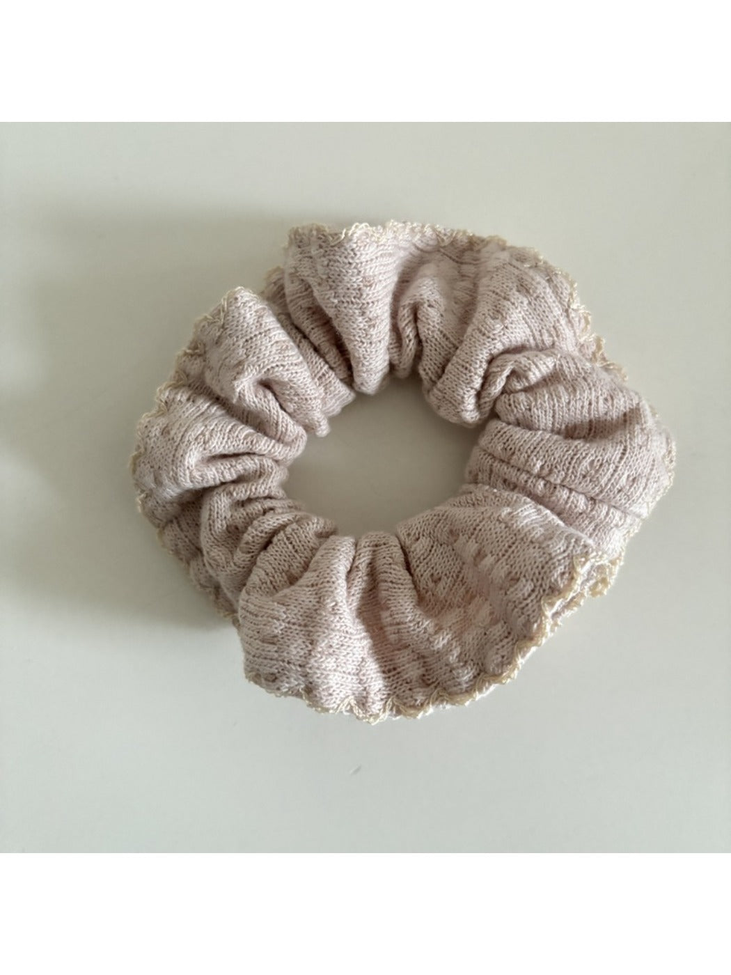 Gifty scrunchie worn in hair, showcasing its trendy and pretty look