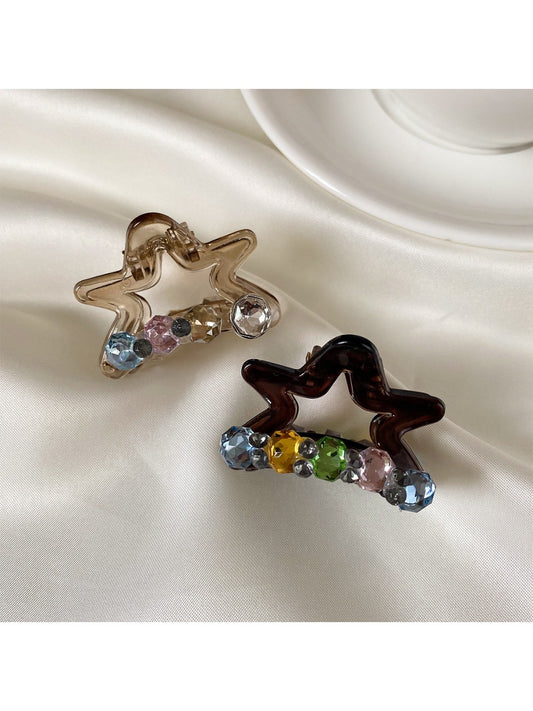 Beau delicate five pointed star shaped claw clip in glossy black finish
