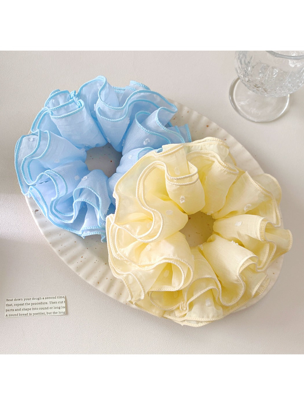 Gifty minimalist solid color four layer scrunchie in soft pastel pink on white background
