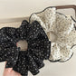 Close-up of Gifty large scrunchie showing detailed tiny floral pattern