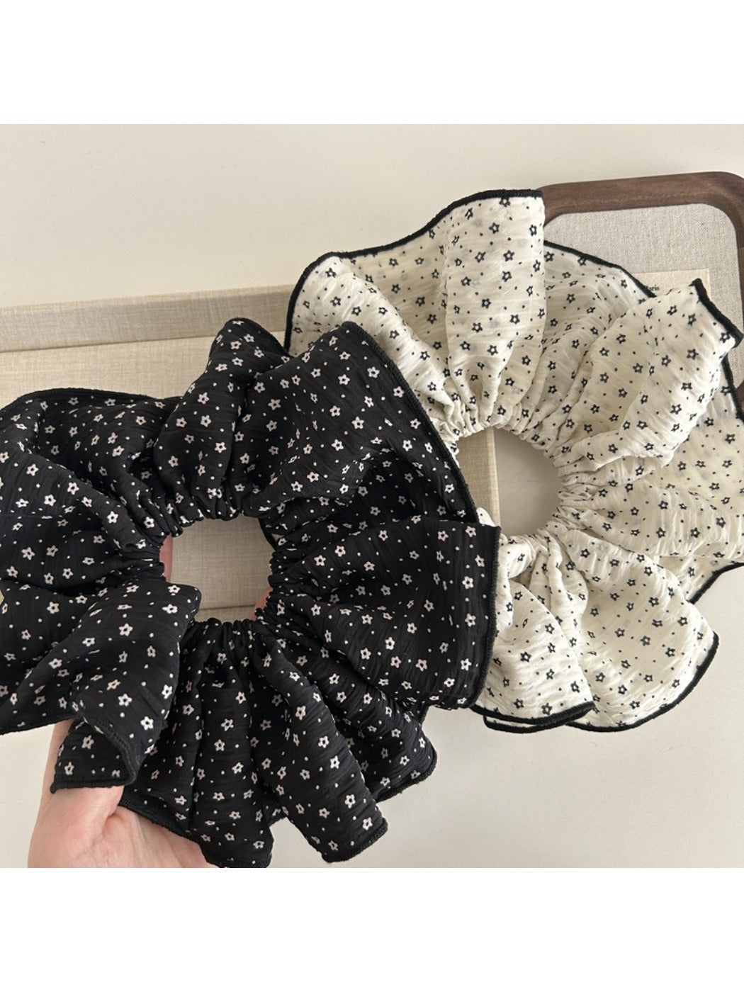 Close-up of Gifty large scrunchie showing detailed tiny floral pattern