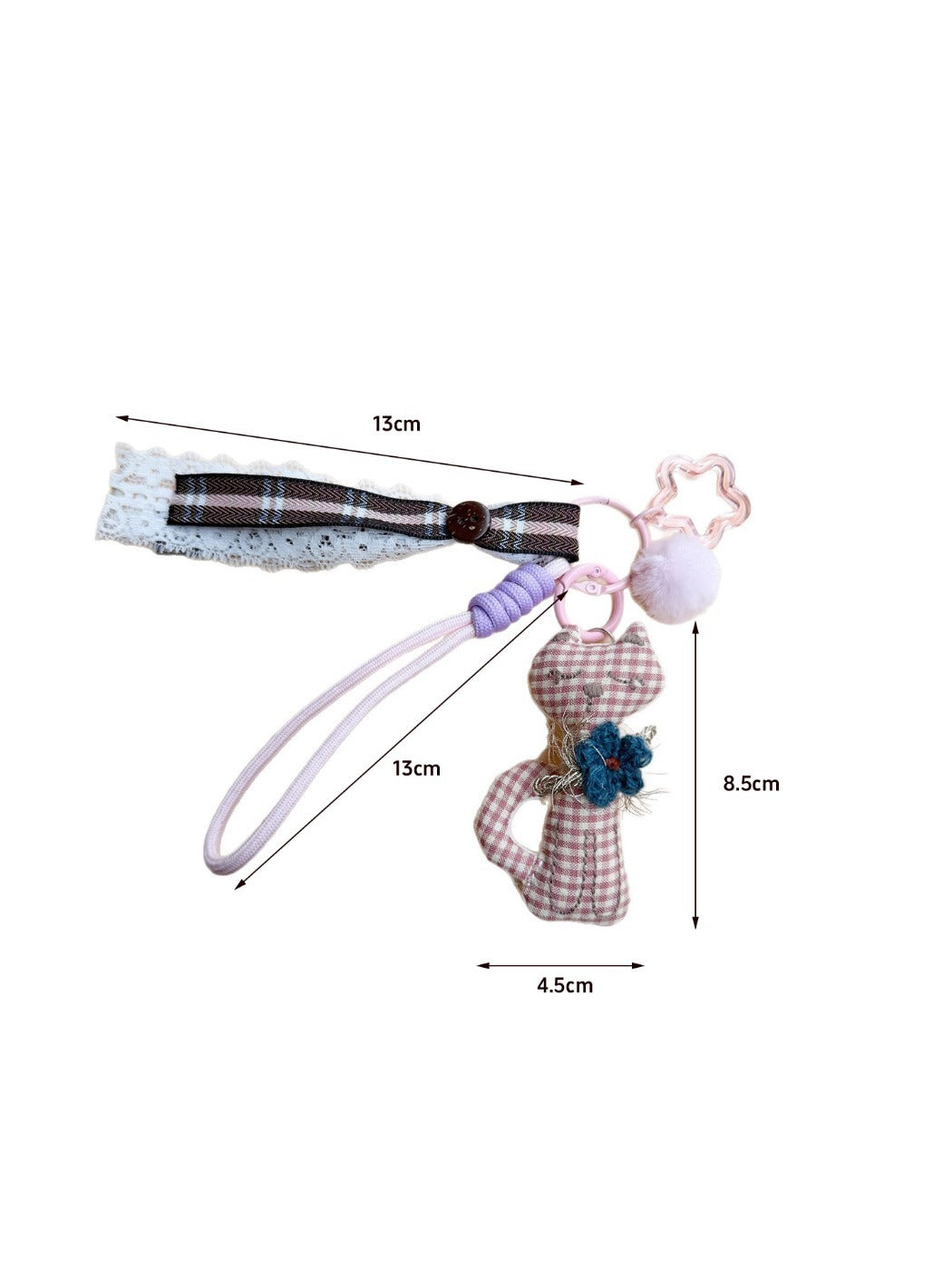 Side view of the cat shaped fabric keychain highlighting its thickness and stitching
