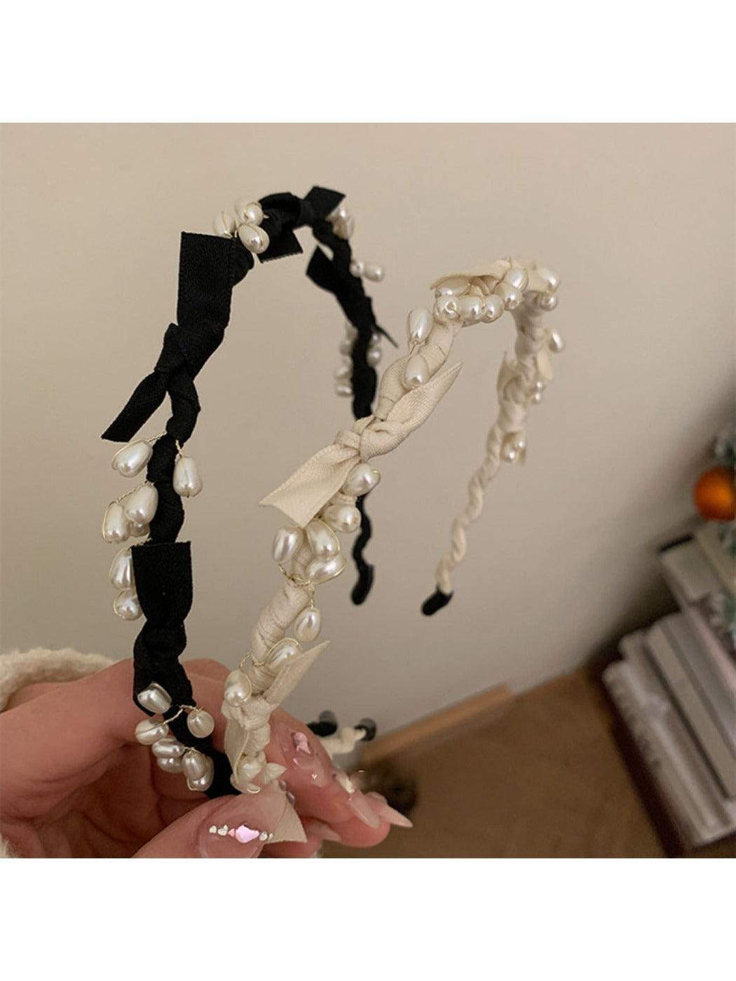 Gifty Sweet Oval Bead Bow Headband worn on model with hair down