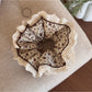 Gifty Retro Lace Floral Scrunchie held in hand showing size and delicate fabric design
