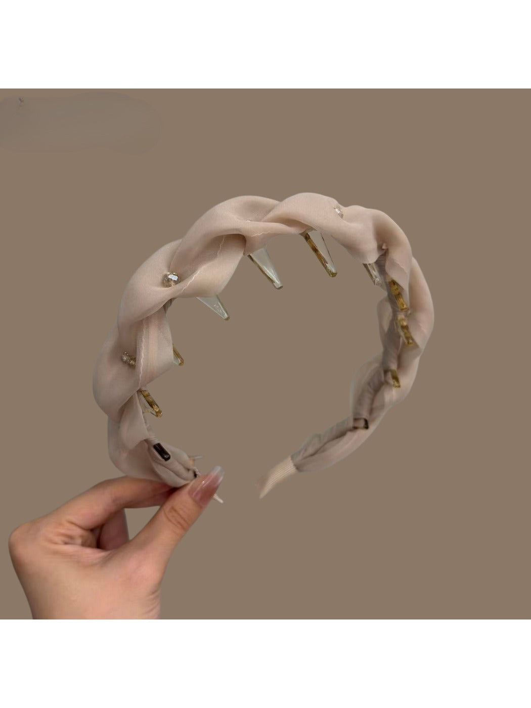 Pink tulle braided headband with soft fabric texture on white background