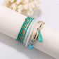 Lovra bracelet featuring natural stone beads and metallic spacers in boho design