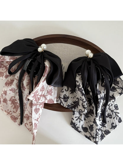 Close-up of Beau Ink Wash Bow Ribbon Claw Clip showing ink wash pattern