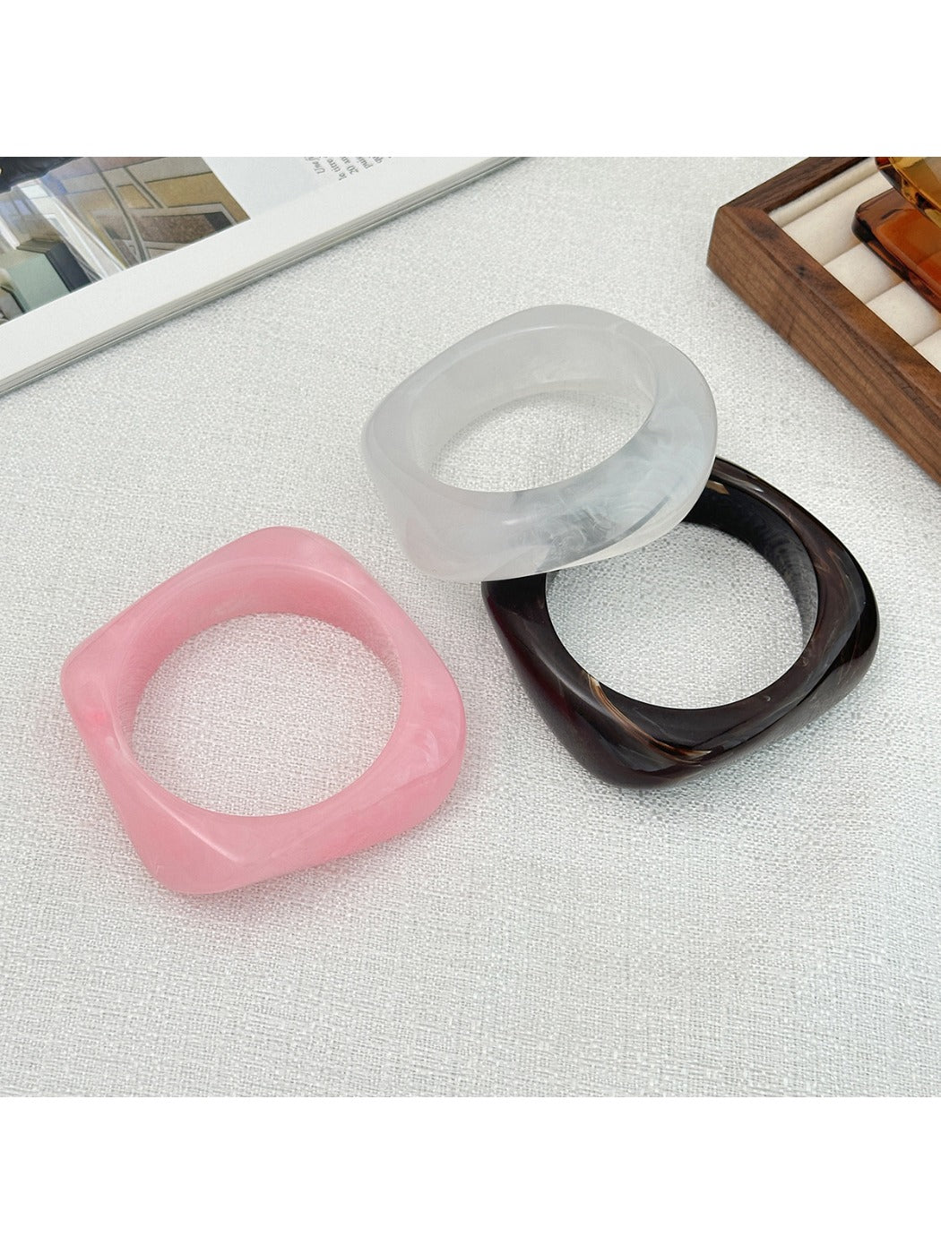 Side view of Lovra vintage wide irregular shaped bangle bracelet highlighting thickness