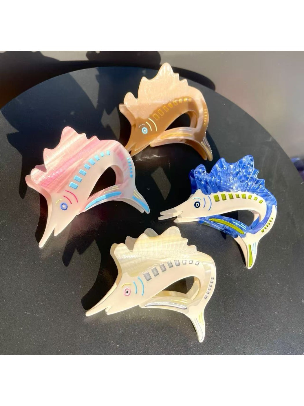 Side view of Beau cartoon sturgeon claw clip highlighting clip mechanism