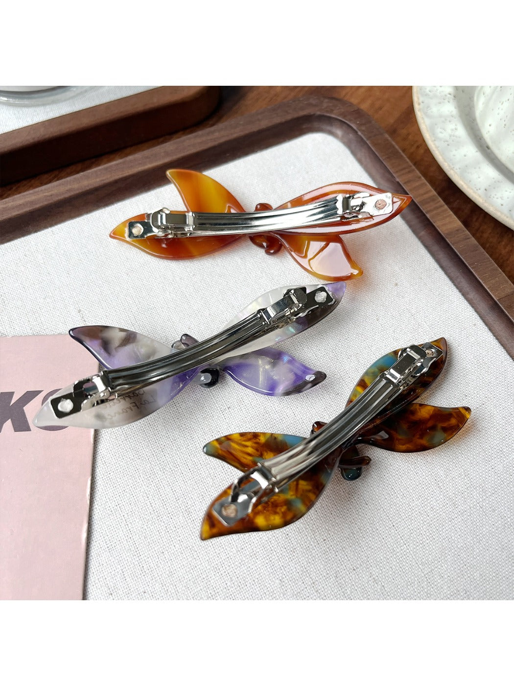Side view of Beau bow shaped updo hair clip highlighting clip mechanism
