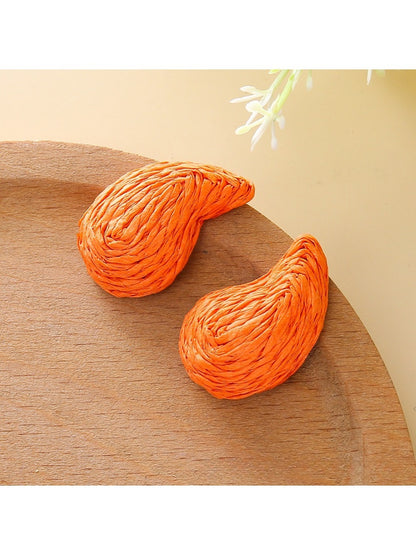 Pair of raffia water drop shaped stud earrings with natural fiber texture