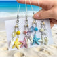 Mini starfish shaped pendant keychain on a white background