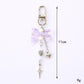 Keypus - Heart Shaped Star Pendant Bow Keychain