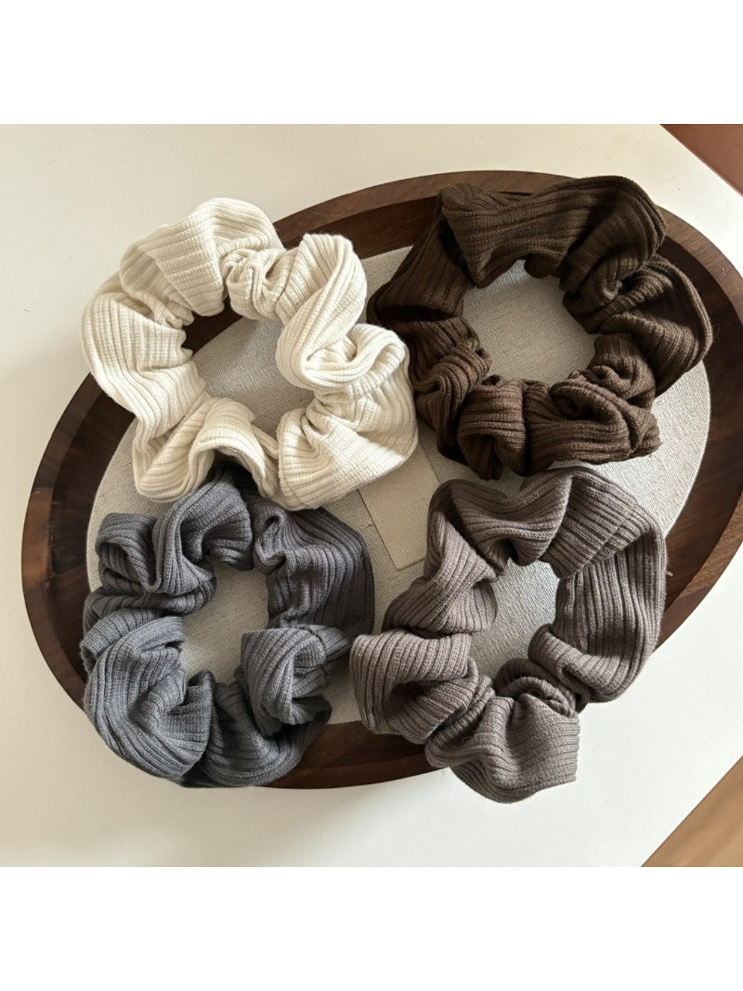 Gifty striped scrunchie displayed on a white background showing fabric texture
