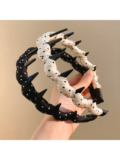 Side view of Gifty polka dot headband on model's head