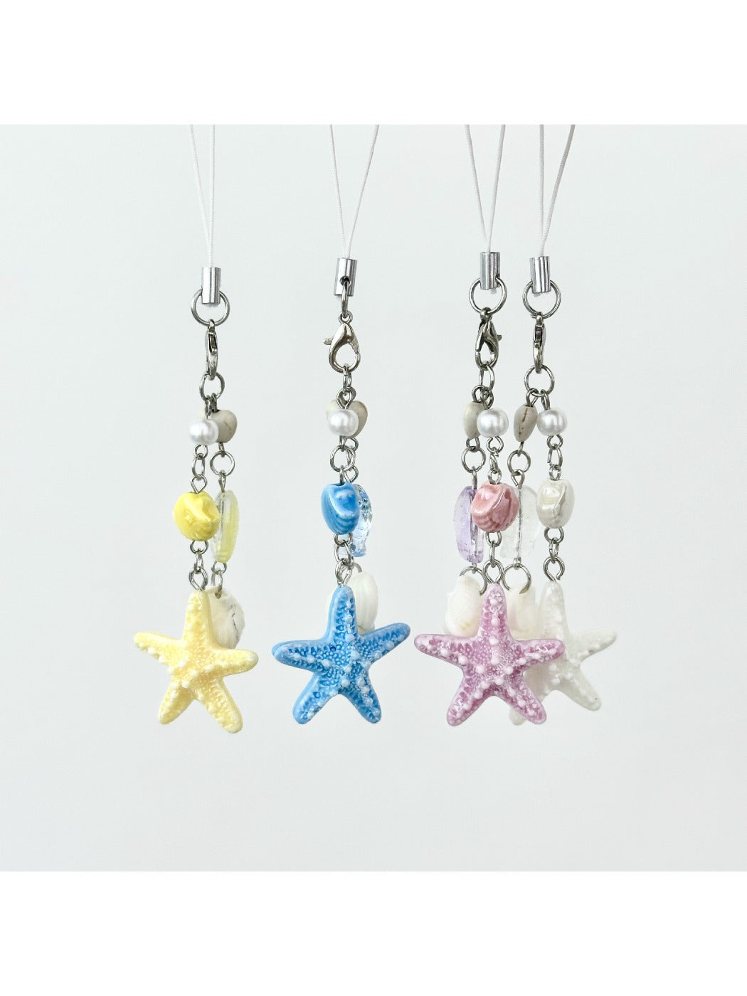 Mini starfish keychain attached to a set of keys