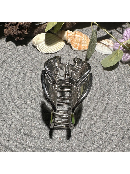 Close-up of Beau leaf shaped hair clip showing textured details