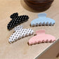 Beau Sweet Polka Dot Stripe Claw Clip held in hand showing size and grip