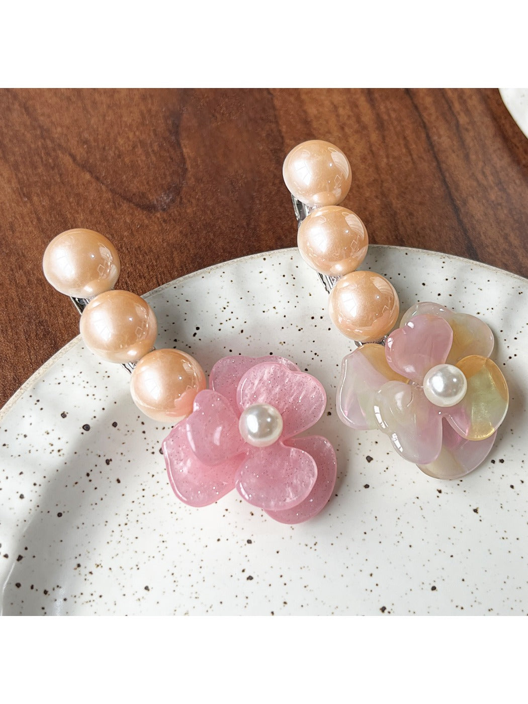Side view of Beau Camellia shaped hair clip with pearl-like beads