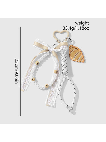 Keypus - Y2K Tassel and Ribbon Heart Keychain Bag Charm