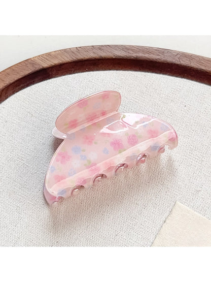 Beau Sweet Pink Floral Print Hair Claw Clip in natural light highlighting colors