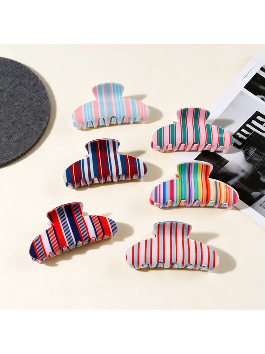 Beau colorful striped half moon claw clip on white background
