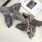 Gifty plaid square scarf scrunchie in beige and brown tones on white background